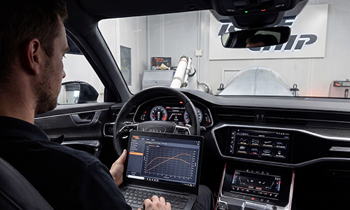 An Audi RS6 being analysed and calibrated on a test bench